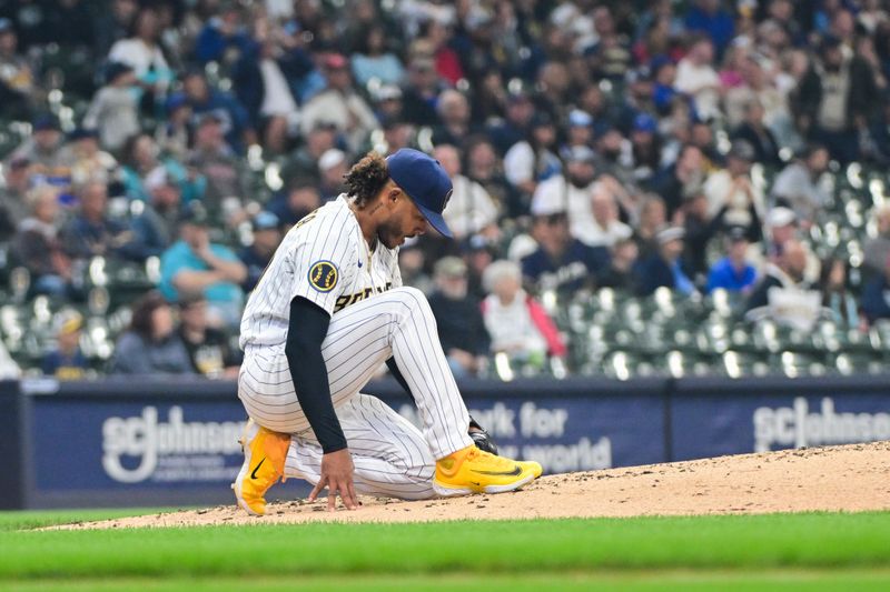 Jun 11, 2023; Milwaukee, Wisconsin, USA;  Milwaukee Brewers pitcher Freddy Peralta (51) reacts after giving up a 3-run home run to Oakland Athletes left fielder Seth Brown (not pictured) in the fourth inning at American Family Field. Mandatory Credit: Benny Sieu-USA TODAY Sports