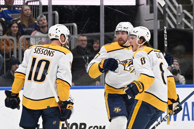 Feb 17, 2024; St. Louis, Missouri, USA; Nashville Predators center Colton Sissons (10) is congratulated by teammates after scoring a goal against the St. Louis Blues during the first period at Enterprise Center. Mandatory Credit: Jeff Le-USA TODAY Sports