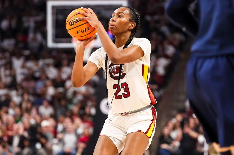 Feb 11, 2024; Columbia, South Carolina, USA; South Carolina Gamecocks guard Bree Hall (23) shoots against the UConn Huskies in the first half at Colonial Life Arena. Mandatory Credit: Jeff Blake-USA TODAY Sports