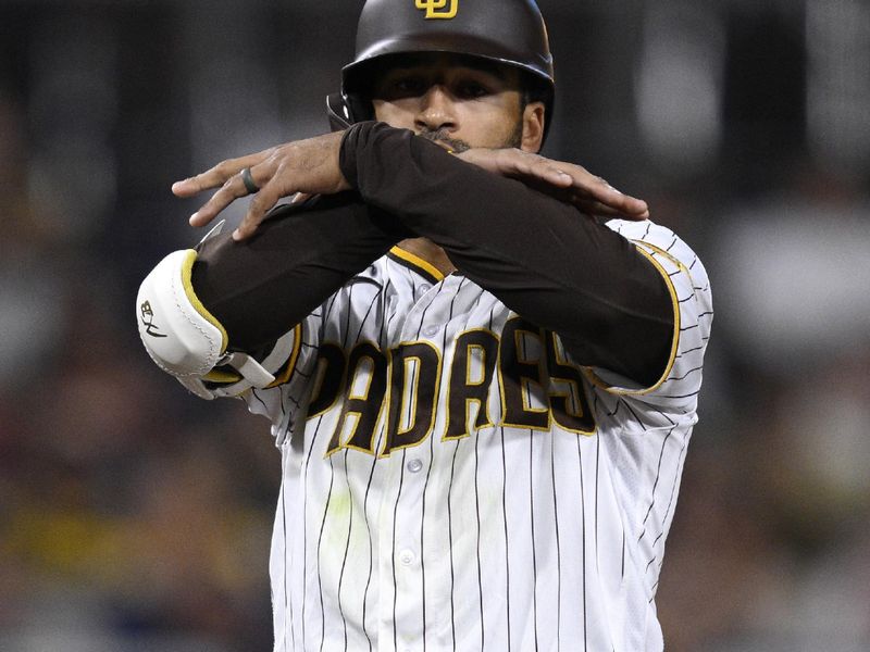 Sep 5, 2023; San Diego, California, USA; San Diego Padres center fielder Trent Grisham (1) celebrates after hitting a double against the Philadelphia Phillies during the third inning at Petco Park. Mandatory Credit: Orlando Ramirez-USA TODAY Sports