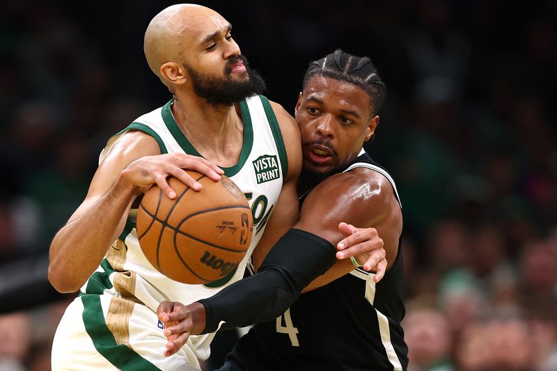 BOSTON, MASSACHUSETTS - NOVEMBER 10:  Dennis Smith Jr. #4 of the Brooklyn Nets defends Jaylen Brown #7 of the Boston Celtics during the second half of their In-Season Tournament game at TD Garden on November 10, 2023 in Boston, Massachusetts. The Celtics defeat the Nets 121-107. NOTE TO USER: User expressly acknowledges and agrees that, by downloading and or using this photograph, User is consenting to the terms and conditions of the Getty Images License Agreement. (Photo by Maddie Meyer/Getty Images)