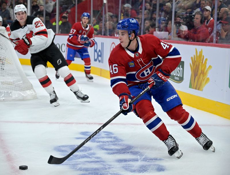 Sep 24, 2024; Montreal, Quebec, CAN; Montreal Canadiens forward Filip Mesar (46) plays the puck against the New Jersey Devils during the first period at the Bell Centre. Mandatory Credit: Eric Bolte-Imagn Images