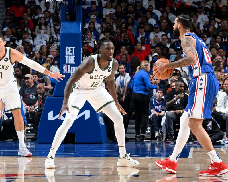 PHILADELPHIA, PA - OCTOBER 23: Taurean Prince #12 of the Milwaukee Bucks plays defense during the game against the Philadelphia 76ers on October 23, 2024 at the Wells Fargo Center in Philadelphia, Pennsylvania NOTE TO USER: User expressly acknowledges and agrees that, by downloading and/or using this Photograph, user is consenting to the terms and conditions of the Getty Images License Agreement. Mandatory Copyright Notice: Copyright 2024 NBAE (Photo by David Dow/NBAE via Getty Images)