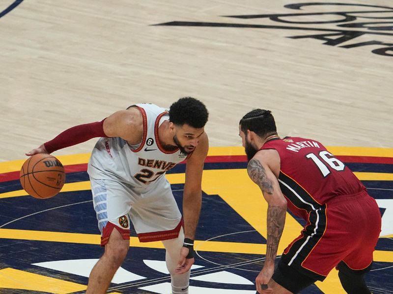 DENVER, CO - JUNE 12: Jamal Murray #27 of the Denver Nuggets goes to the basket during the game during Game Five of the 2023 NBA Finals on June 12, 2023 at the Ball Arena in Denver, Colorado. NOTE TO USER: User expressly acknowledges and agrees that, by downloading and/or using this Photograph, user is consenting to the terms and conditions of the Getty Images License Agreement. Mandatory Copyright Notice: Copyright 2023 NBAE (Photo by Bart Young/NBAE via Getty Images)