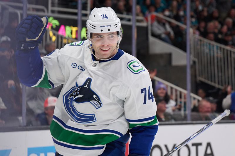 Nov 2, 2024; San Jose, California, USA; Vancouver Canucks left wing Jake DeBrusk (74) reacts after scoring a goal against the San Jose Sharks during the third period at SAP Center at San Jose. Mandatory Credit: Robert Edwards-Imagn Images