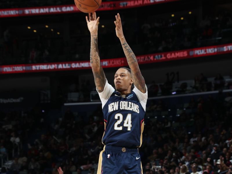 NEW ORLEANS, LA - JANUARY 17:  Jordan Hawkins #24 of the New Orleans Pelicans shoots a three point basket during the game against the Utah Jazz on January 17, 2025 at the Smoothie King Center in New Orleans, Louisiana. NOTE TO USER: User expressly acknowledges and agrees that, by downloading and or using this Photograph, user is consenting to the terms and conditions of the Getty Images License Agreement. Mandatory Copyright Notice: Copyright 2025 NBAE (Photo by Layne Murdoch Jr./NBAE via Getty Images)