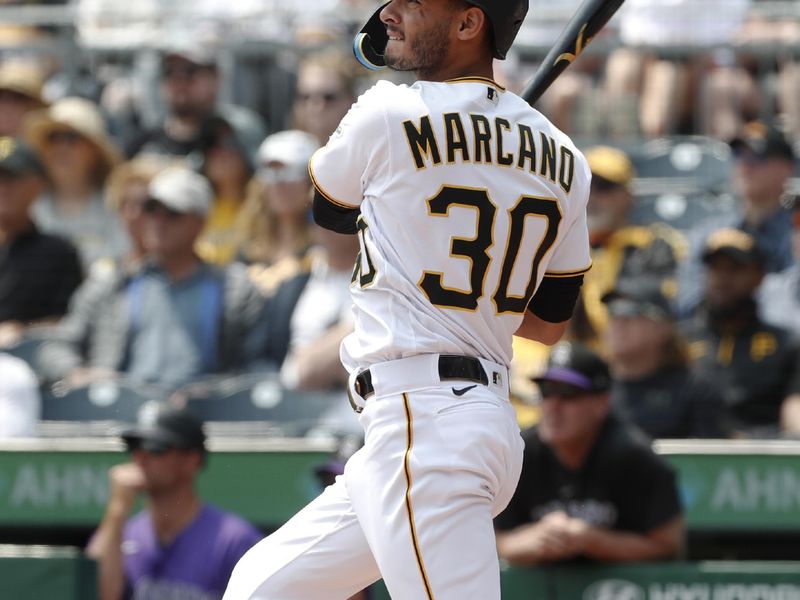 May 10, 2023; Pittsburgh, Pennsylvania, USA;  Pittsburgh Pirates second baseman Tucupita Marcano (30) hits a solo home run against the Colorado Rockies during the second inning at PNC Park. Mandatory Credit: Charles LeClaire-USA TODAY Sports