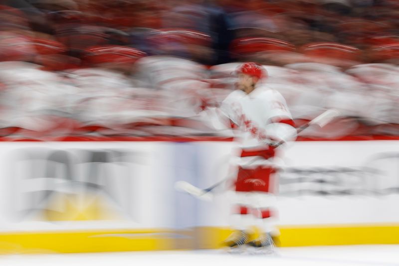 May 6, 2025; Washington, District of Columbia, USA; Carolina Hurricanes center Logan Stankoven (22) celebrates with teammates after scoring a goal against the Washington Capitals in the third period in game one of the second round of the 2025 Stanley Cup Playoffs at Capital One Arena. Mandatory Credit: Geoff Burke-Imagn Images