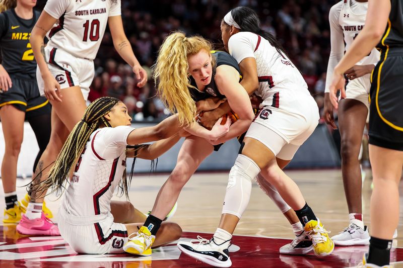 Jan 15, 2023; Columbia, South Carolina, USA; South Carolina Gamecocks forward Victaria Saxton (5), Missouri Tigers guard Lauren Hansen (1) and South Carolina Gamecocks guard Zia Cooke (1) battle for a loose ball in the first half at Colonial Life Arena. Mandatory Credit: Jeff Blake-USA TODAY Sports