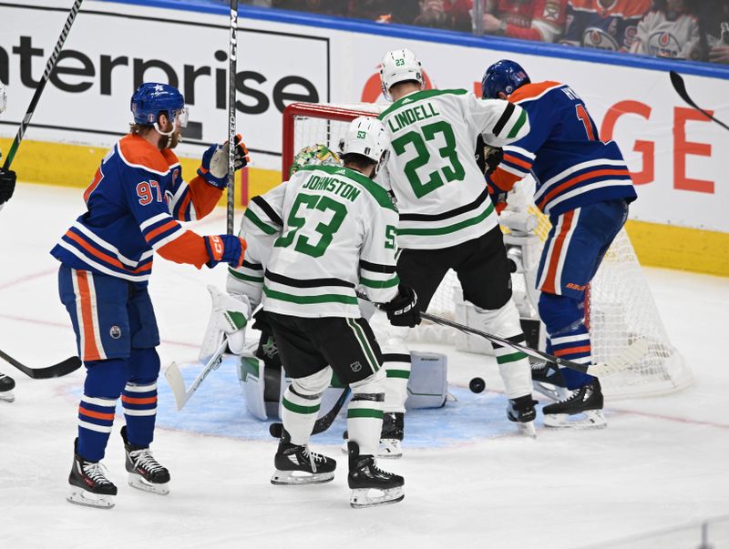 Jun 2, 2024; Edmonton, Alberta, CAN; Edmonton Oilers centre Connor McDavid (97) watches his goal on Dallas Stars goalie Jake Oettinger (29) during the first period in game six of the Western Conference Final of the 2024 Stanley Cup Playoffs at Rogers Place. Mandatory Credit: Walter Tychnowicz-USA TODAY Sports