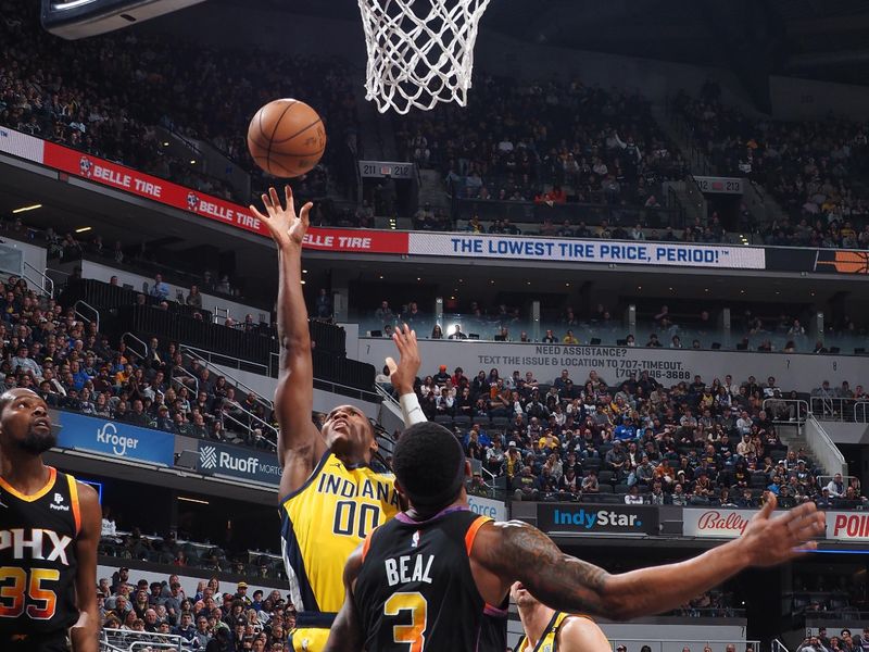 INDIANAPOLIS, IN - JANUARY 26: Bennedict Mathurin #00 of the Indiana Pacers drives to the basket during the game against the Phoenix Suns on January 26, 2024 at Gainbridge Fieldhouse in Indianapolis, Indiana. NOTE TO USER: User expressly acknowledges and agrees that, by downloading and or using this Photograph, user is consenting to the terms and conditions of the Getty Images License Agreement. Mandatory Copyright Notice: Copyright 2024 NBAE (Photo by Ron Hoskins/NBAE via Getty Images)