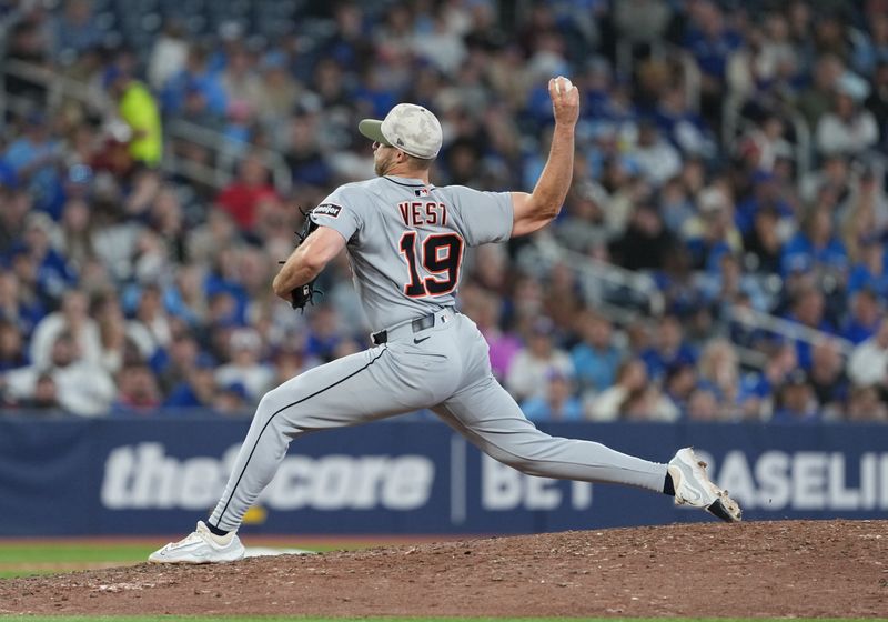 May 18, 2025; Toronto, Ontario, CAN; Detroit Tigers relief pitcher Will Vest (19) throws a pitch against the Toronto Blue Jays during the ninth at Rogers Centre. Mandatory Credit: Nick Turchiaro-Imagn Images