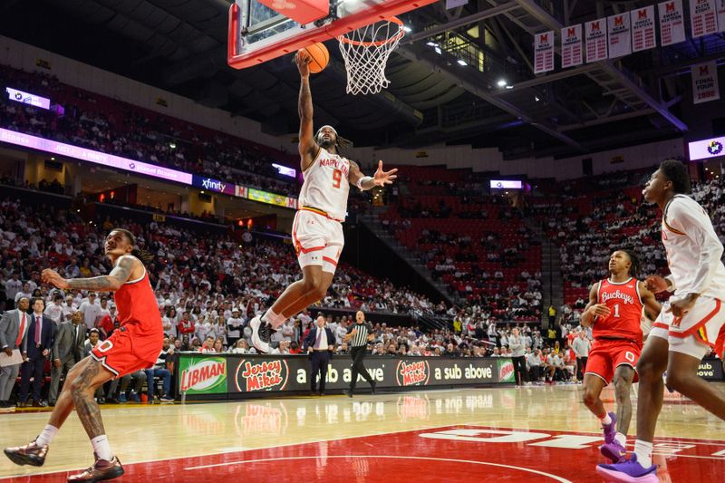 Dec 4, 2024; College Park, Maryland, USA; Maryland Terrapins guard Selton Miguel (9) shoots a lay up during the second half against the Ohio State Buckeyes  at Xfinity Center. Mandatory Credit: Reggie Hildred-Imagn Images