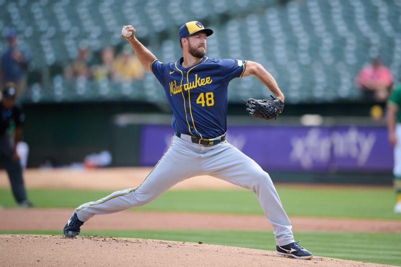 Aug 24, 2024; Oakland, California, USA; Milwaukee Brewers starting pitcher Colin Rea (48) throws a pitch against the Oakland Athletics during the first inning at Oakland-Alameda County Coliseum. Mandatory Credit: Robert Edwards-USA TODAY Sports