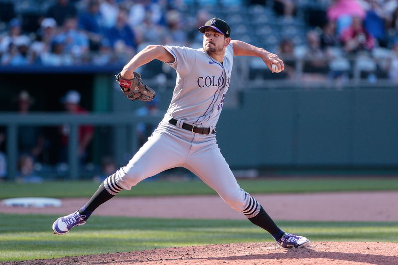 Jun 3, 2023; Kansas City, Missouri, USA;  Colorado Rockies relief pitcher Brad Hand (55) pitches during the eighth inning against the Kansas City Royals at Kauffman Stadium. Mandatory Credit: William Purnell-USA TODAY Sports