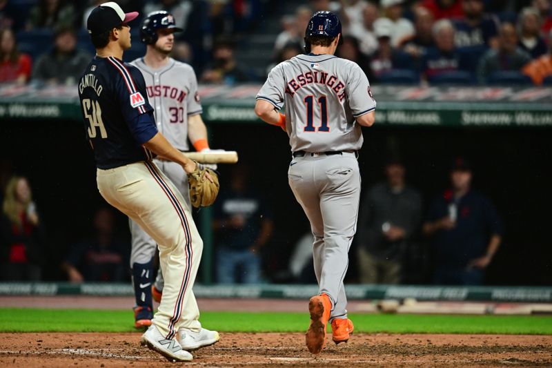 Sep 27, 2024; Cleveland, Ohio, USA; Houston Astros shortstop Grae Kessinger (11) scores on wild pitch during the fourth inning against the Cleveland Guardians at Progressive Field. Mandatory Credit: Ken Blaze-Imagn Images