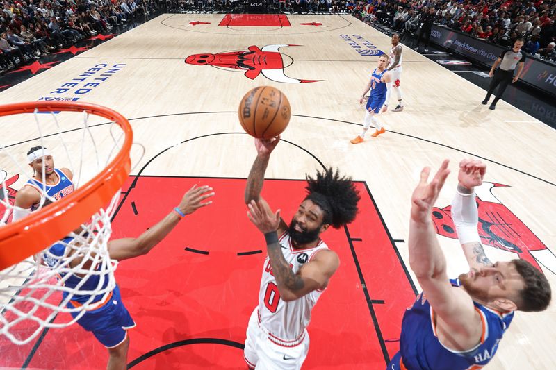 CHICAGO, IL - APRIL 9: Coby White #0 of the Chicago Bulls shoots the ball during the game against the New York Knicks on April 9, 2024 at United Center in Chicago, Illinois. NOTE TO USER: User expressly acknowledges and agrees that, by downloading and or using this photograph, User is consenting to the terms and conditions of the Getty Images License Agreement. Mandatory Copyright Notice: Copyright 2024 NBAE (Photo by Jeff Haynes/NBAE via Getty Images)