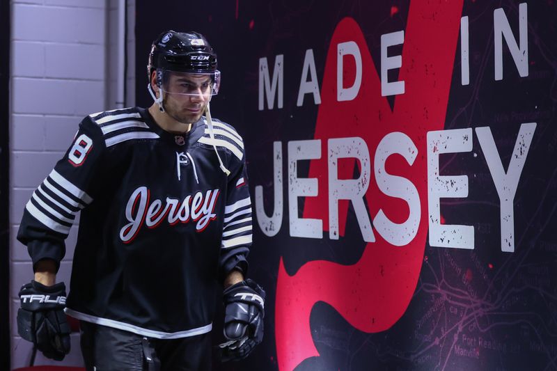 Dec 23, 2023; Newark, New Jersey, USA; New Jersey Devils right wing Timo Meier (28) walks to the locker room after the Devils win over the Detroit Red Wings at Prudential Center. Mandatory Credit: Ed Mulholland-USA TODAY Sports