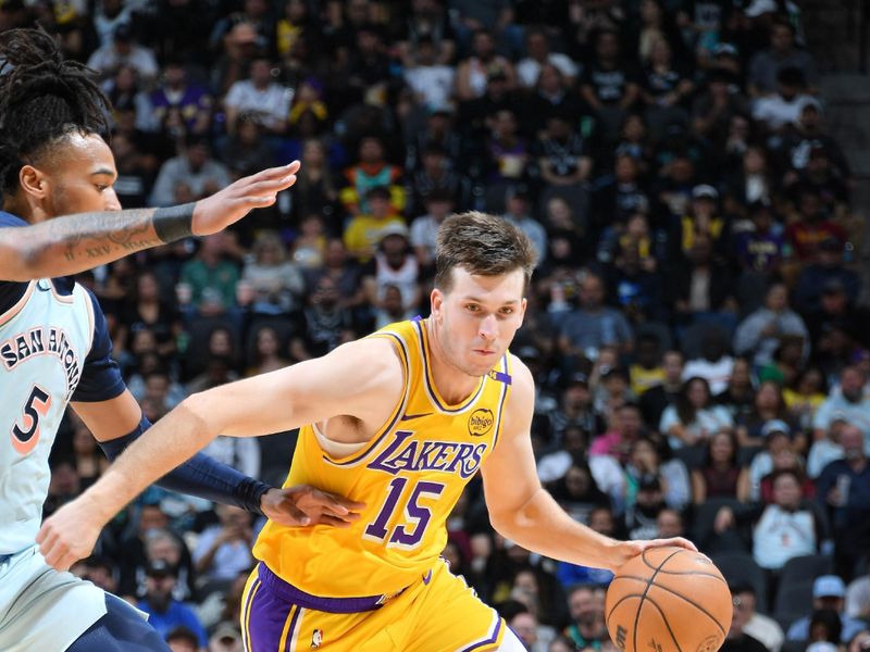 SAN ANTONIO, TX - NOVEMBER 27: Austin Reaves #15 of the Los Angeles Lakers dribbles the ball during the game against the San Antonio Spurs on November 27, 2024 at the Frost Bank Center in San Antonio, Texas. NOTE TO USER: User expressly acknowledges and agrees that, by downloading and or using this photograph, user is consenting to the terms and conditions of the Getty Images License Agreement. Mandatory Copyright Notice: Copyright 2024 NBAE (Photos by Michael Gonzales/NBAE via Getty Images)