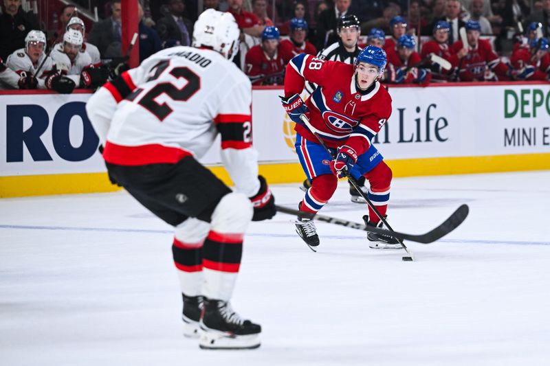 Oct 4, 2025; Montreal, Quebec, CAN; Montreal Canadiens defenseman Lane Hutson (48) plays the puck against Ottawa Senators right wing Michael Amadio (22) during the first period at Bell Centre. Mandatory Credit: David Kirouac-Imagn Images