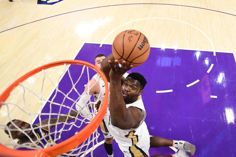 LOS ANGELES, CA - FEBRUARY 9:  Zion Williamson #1 of the New Orleans Pelicans drives to the basket during the game against the Los Angeles Lakers on February 9, 2024 at Crypto.Com Arena in Los Angeles, California. NOTE TO USER: User expressly acknowledges and agrees that, by downloading and/or using this Photograph, user is consenting to the terms and conditions of the Getty Images License Agreement. Mandatory Copyright Notice: Copyright 2024 NBAE (Photo by Adam Pantozzi/NBAE via Getty Images)