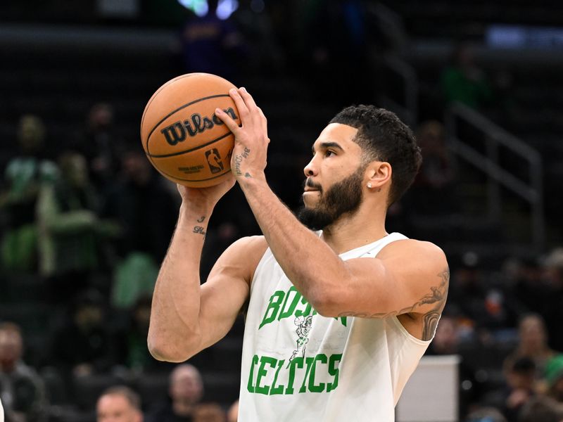 BOSTON, MASSACHUSETTS - FEBRUARY 01: Jayson Tatum #0 of the Boston Celtics takes a shot during warmups before a game against the Los Angeles Lakers at the TD Garden on February 01, 2024 in Boston, Massachusetts. NOTE TO USER: User expressly acknowledges and agrees that, by downloading and or using this photograph, User is consenting to the terms and conditions of the Getty Images License Agreement. (Photo by Brian Fluharty/Getty Images)