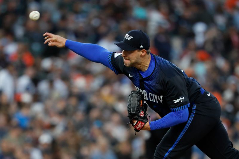 May 9, 2025; Detroit, Michigan, USA;  Detroit Tigers relief pitcher Tommy Kahnle (43) pitches in the eighth inning against the Texas Rangers at Comerica Park. Mandatory Credit: Rick Osentoski-Imagn Images