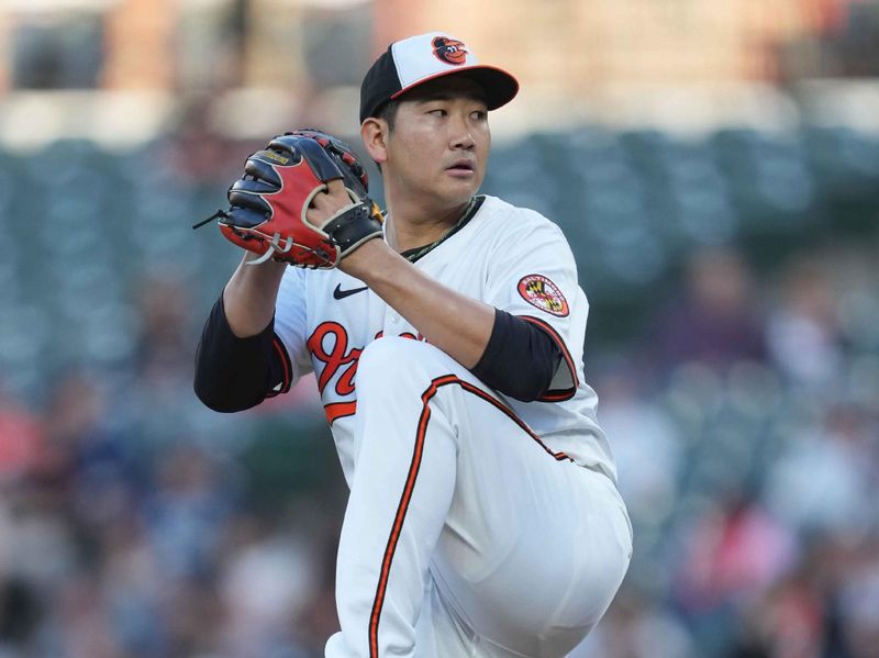 Apr 28, 2025; Baltimore, Maryland, USA; Baltimore Orioles  pitcher Tomoyuki Sugano (19) delivers during the third inning against the New York Yankees at Oriole Park at Camden Yards. Mandatory Credit: Mitch Stringer-Imagn Images