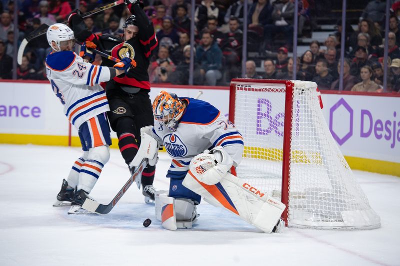 Nov 19, 2024; Ottawa, Ontario, CAN; Edmonton Oilers goalie Stuart Skinner (74) makes a save in front of Ottawa Senators right wing Drake Batherson (19) in the first period at the Canadian Tire Centre. Mandatory Credit: Marc DesRosiers-Imagn Images