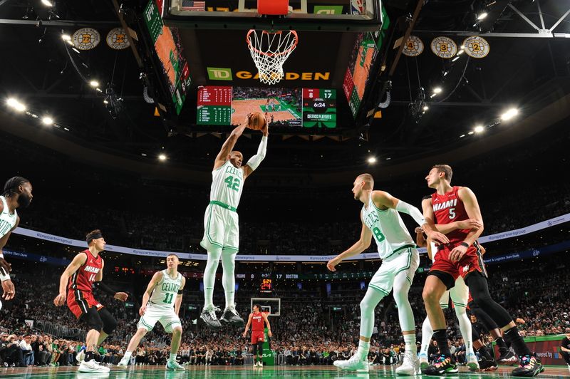 BOSTON, MA - APRIL 21: Al Horford #42 of the Boston Celtics grabs a rebound during the game against the Miami Heat during Round 1 Game 1 of the 2024 NBA Playoffs on April 21, 2024 at the TD Garden in Boston, Massachusetts. NOTE TO USER: User expressly acknowledges and agrees that, by downloading and or using this photograph, User is consenting to the terms and conditions of the Getty Images License Agreement. Mandatory Copyright Notice: Copyright 2024 NBAE  (Photo by Brian Babineau/NBAE via Getty Images)