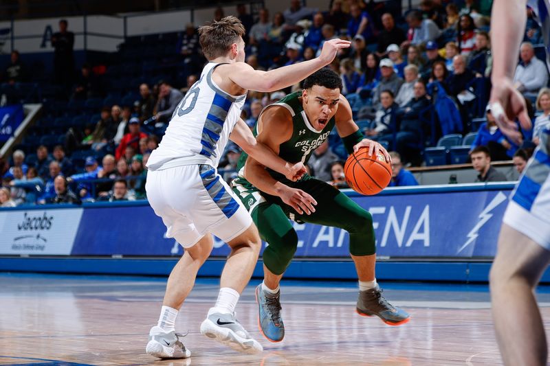 Feb 7, 2023; Colorado Springs, Colorado, USA; Colorado State Rams guard John Tonje (1) controls the ball as Air Force Falcons guard Camden Vander Zwaag (30) guards in the first half at Clune Arena. Mandatory Credit: Isaiah J. Downing-USA TODAY Sports