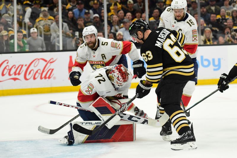 May 17, 2024; Boston, Massachusetts, USA; Florida Panthers goaltender Sergei Bobrovsky (72) makes a save in front of Boston Bruins left wing Brad Marchand (63) during the first period in game six of the second round of the 2024 Stanley Cup Playoffs at TD Garden. Mandatory Credit: Bob DeChiara-USA TODAY Sports