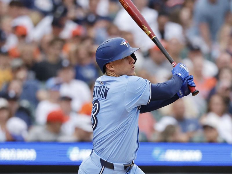 Jul 26, 2025; Detroit, Michigan, USA;  Toronto Blue Jays outfielder Myles Straw (3) hits a single in the fifth inning against the Detroit Tigers at Comerica Park. Mandatory Credit: Rick Osentoski-Imagn Images
