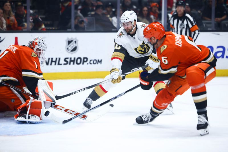 Nov 13, 2024; Anaheim, California, USA; Vegas Golden Knights center Nicolas Roy (10) shoots against the Anaheim Ducks during the first period of a hockey game at Honda Center. Mandatory Credit: Jessica Alcheh-Imagn Images