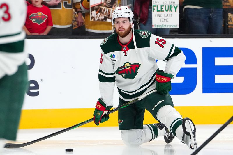 Apr 29, 2025; Las Vegas, Nevada, USA; Minnesota Wild right wing Justin Brazeau (15) warms up before the start of game five of the first round of the 2025 Stanley Cup Playoffs against the Vegas Golden Knights at T-Mobile Arena. Mandatory Credit: Stephen R. Sylvanie-Imagn Images