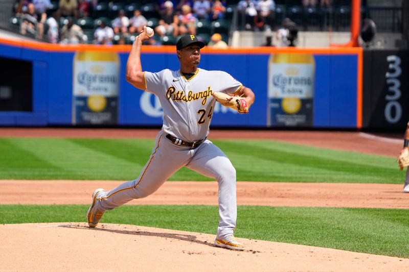 Aug 16, 2023; New York City, New York, USA; Pittsburgh Pirates pitcher Johan Oviedo (24) delivers a pitch against the New York Mets during the first inning at Citi Field. Mandatory Credit: Gregory Fisher-USA TODAY Sports