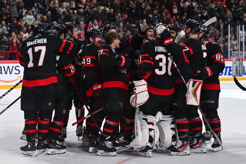 Nov 18, 2023; Stockholm, SWE; Ottawa Senators players celebrate with Ottawa Senators goaltender Anton Forsberg (31) after defeating the Minnesota Wild in a shootout during a Global Series NHL hockey game at Avicii Arena. Mandatory Credit: Per Haljestam-USA TODAY Sports