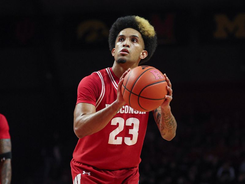 Feb 10, 2024; Piscataway, New Jersey, USA; Wisconsin Badgers guard Chucky Hepburn (23) shoots a free throw against the Rutgers Scarlet Knights during the first half at Jersey Mike's Arena. Mandatory Credit: Vincent Carchietta-USA TODAY Sports