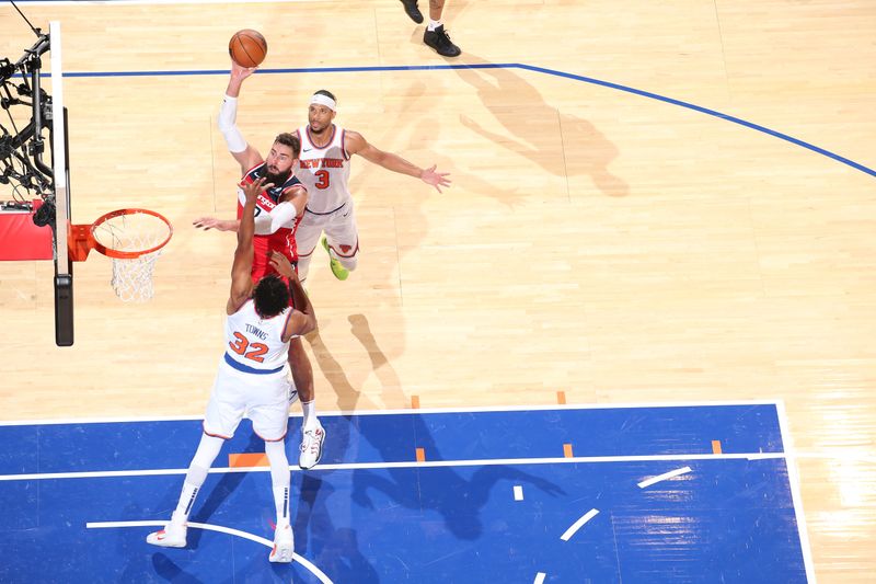 NEW YORK, NY - OCTOBER 9: Jonas Valanciunas #17 of the Washington Wizards drives to the basket during the game against the New York Knicks during the 2024 NBA Preseason on October 9, 2024 at Madison Square Garden in New York City, New York.  NOTE TO USER: User expressly acknowledges and agrees that, by downloading and or using this photograph, User is consenting to the terms and conditions of the Getty Images License Agreement. Mandatory Copyright Notice: Copyright 2024 NBAE  (Photo by Nathaniel S. Butler/NBAE via Getty Images)