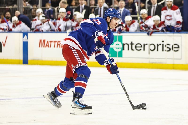 Apr 7, 2024; New York, New York, USA;  New York Rangers left wing Jimmy Vesey (26) looks to make a pass in the second period against the Montreal Canadiens at Madison Square Garden. Mandatory Credit: Wendell Cruz-USA TODAY Sports