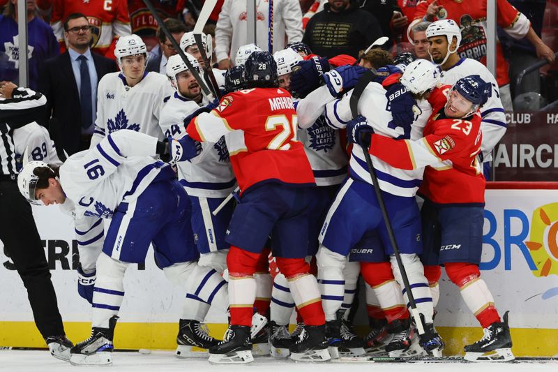 Apr 16, 2024; Sunrise, Florida, USA; Florida Panthers and Toronto Maple Leafs players scuffle during the first period at Amerant Bank Arena. Mandatory Credit: Sam Navarro-USA TODAY Sports