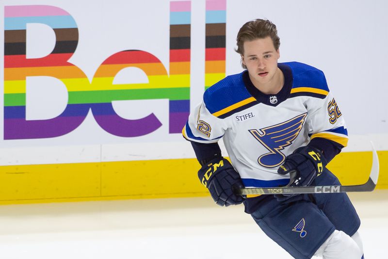 Mar 21, 2024; Ottawa, Ontario, CAN; St. Louis Blues center Zach Dean (52) warms up prior to playing in his first NHL game against the Ottawa Senators at the Canadian Tire Centre. Mandatory Credit: Marc DesRosiers-USA TODAY Sports