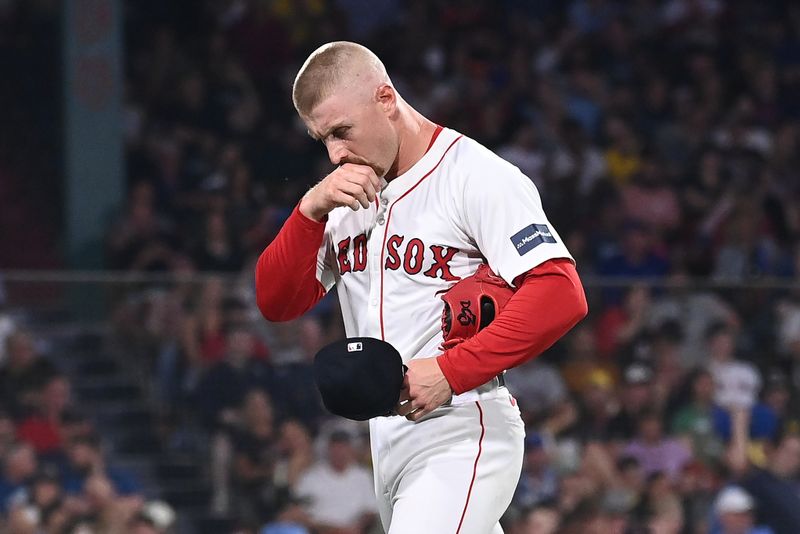 Aug 13, 2024; Boston, Massachusetts, USA; Boston Red Sox pitcher Cam Booser (71) is removed from the game during the sixth inning against the Texas Rangers at Fenway Park. Mandatory Credit: Eric Canha-USA TODAY Sports