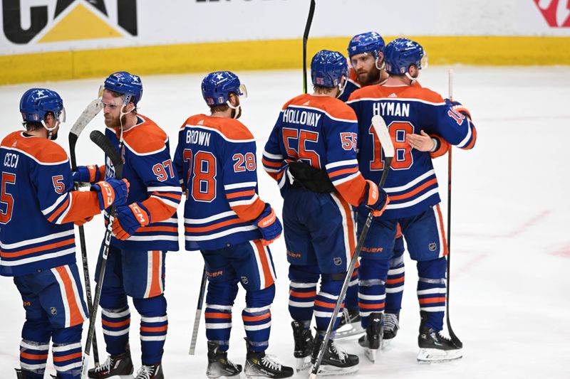 Jun 2, 2024; Edmonton, Alberta, CAN; Edmonton Oilers players celebrate their win at the end of the third period in game six of the Western Conference Final of the 2024 Stanley Cup Playoffs at Rogers Place. Mandatory Credit: Walter Tychnowicz-USA TODAY Sports