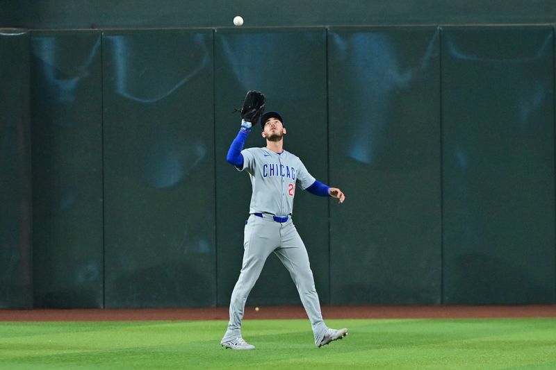 Apr 17, 2024; Phoenix, Arizona, USA; Chicago Cubs outfielder Cody Bellinger (24) catches a fly ball in the eighth inning against the Arizona Diamondbacks at Chase Field. Mandatory Credit: Matt Kartozian-USA TODAY Sports