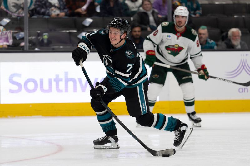 Nov 7, 2024; San Jose, California, USA;  San Jose Sharks center Macklin Celebrini (71) shoots during the second period against the Minnesota Wild at SAP Center at San Jose. Mandatory Credit: Stan Szeto-Imagn Images