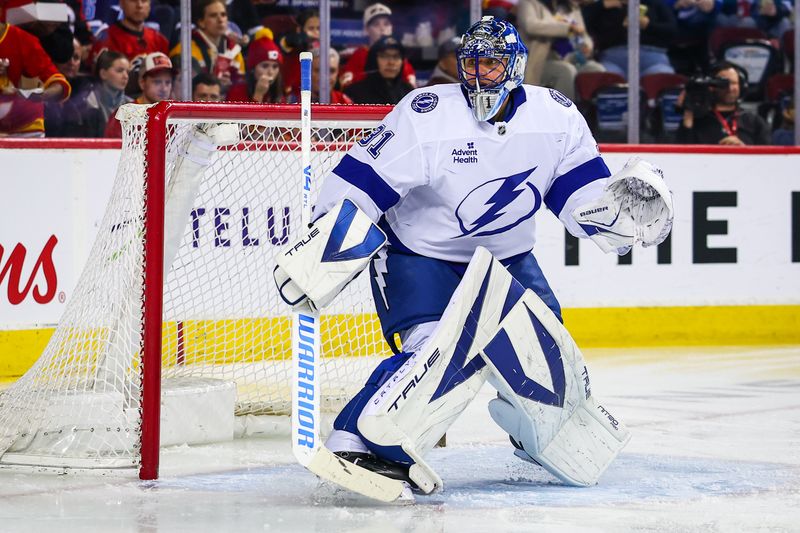 Mar 22, 2026; Calgary, Alberta, CAN; Tampa Bay Lightning goaltender Jonas Johansson (31) guards his net against the Calgary Flames during the second period at Scotiabank Saddledome. Mandatory Credit: Sergei Belski-Imagn Images