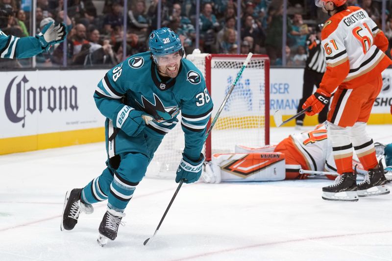 Oct 11, 2025; San Jose, California, USA; San Jose Sharks defenseman Mario Ferraro (38) reacts after scoring a goal against the Anaheim Ducks during the second period at SAP Center at San Jose. Mandatory Credit: Darren Yamashita-Imagn Images