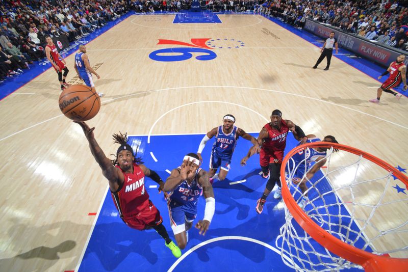 PHILADELPHIA, PA - MARCH 18: Delon Wright #4 of the Miami Heat drives to the basket during the game against the Philadelphia 76ers on March 18, 2024 at the Wells Fargo Center in Philadelphia, Pennsylvania NOTE TO USER: User expressly acknowledges and agrees that, by downloading and/or using this Photograph, user is consenting to the terms and conditions of the Getty Images License Agreement. Mandatory Copyright Notice: Copyright 2024 NBAE (Photo by Jesse D. Garrabrant/NBAE via Getty Images)