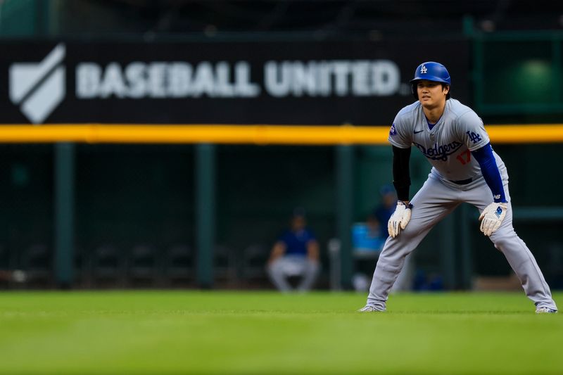 May 24, 2024; Cincinnati, Ohio, USA; Los Angeles Dodgers designated hitter Shohei Ohtani (17) leads off from first in the first inning against the Cincinnati Reds at Great American Ball Park. Mandatory Credit: Katie Stratman-USA TODAY Sports